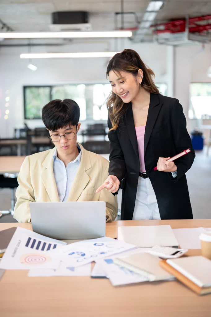 asian-businesswoman-pointing-at-laptop-talking-or-2026-03-05-11-52-10-utc asian-businesswoman-pointing-at-laptop-talking-or-2026-03-05-11-52-10-utc